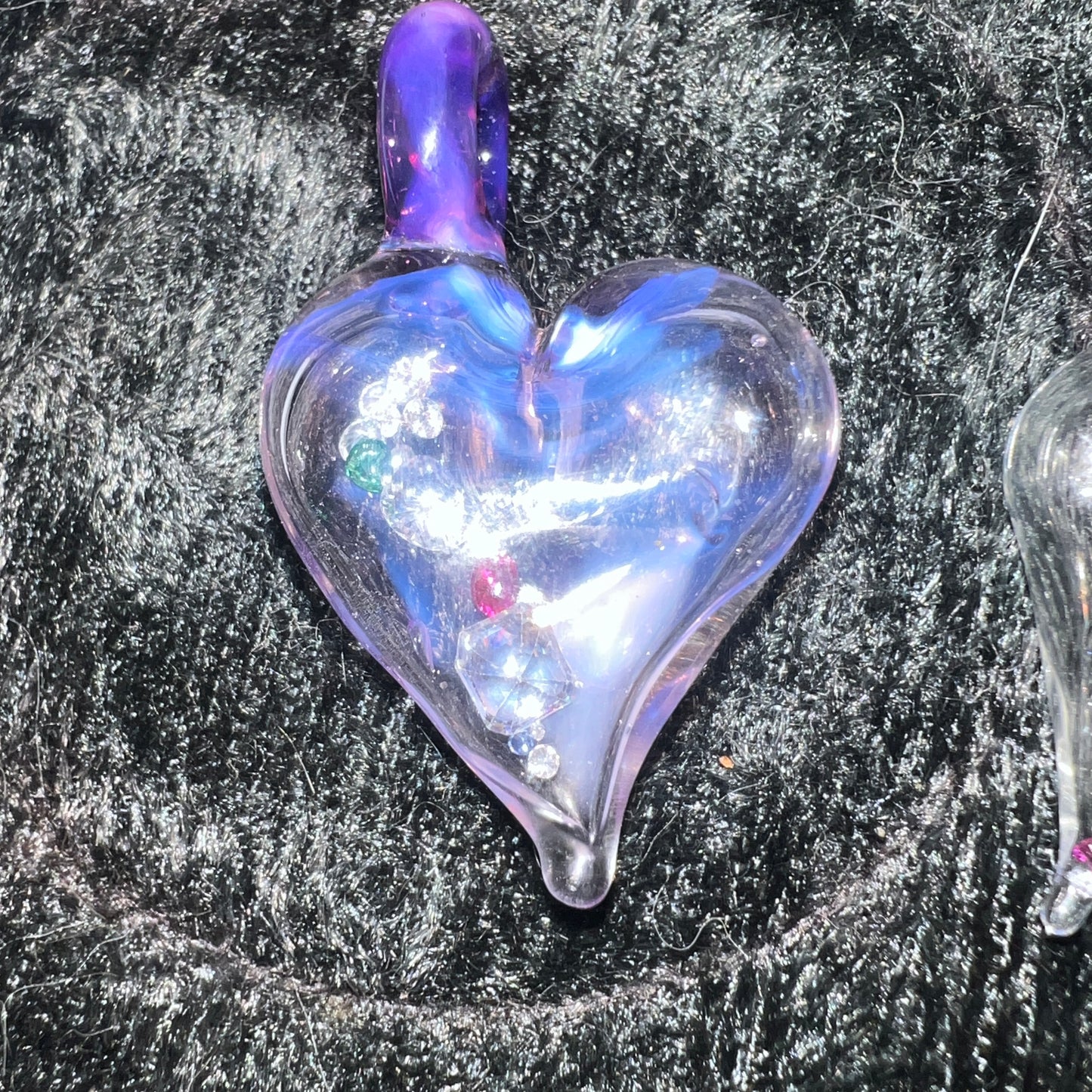 Hollow heart pendant filled with real Gemstones