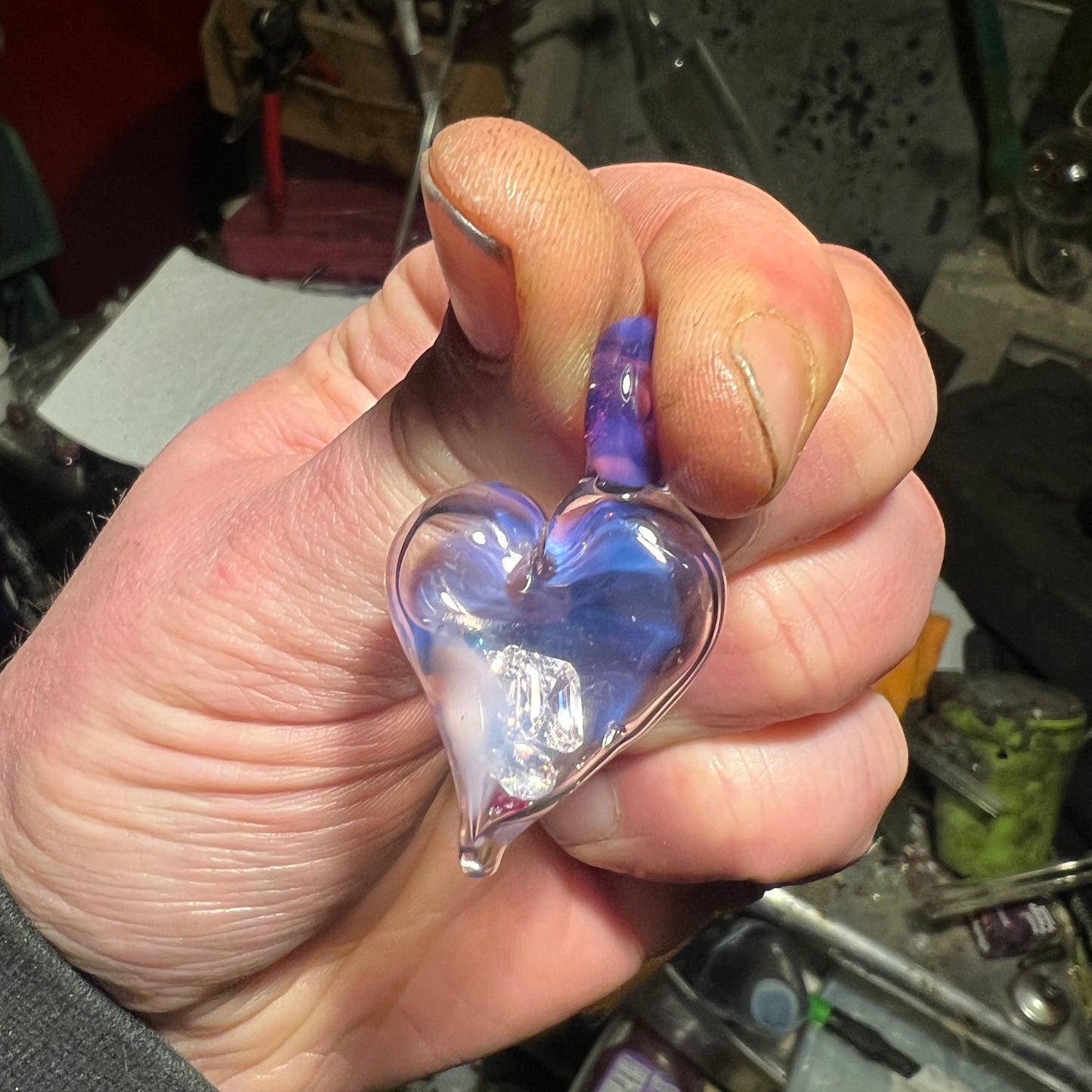 Hollow heart pendant filled with real Gemstones