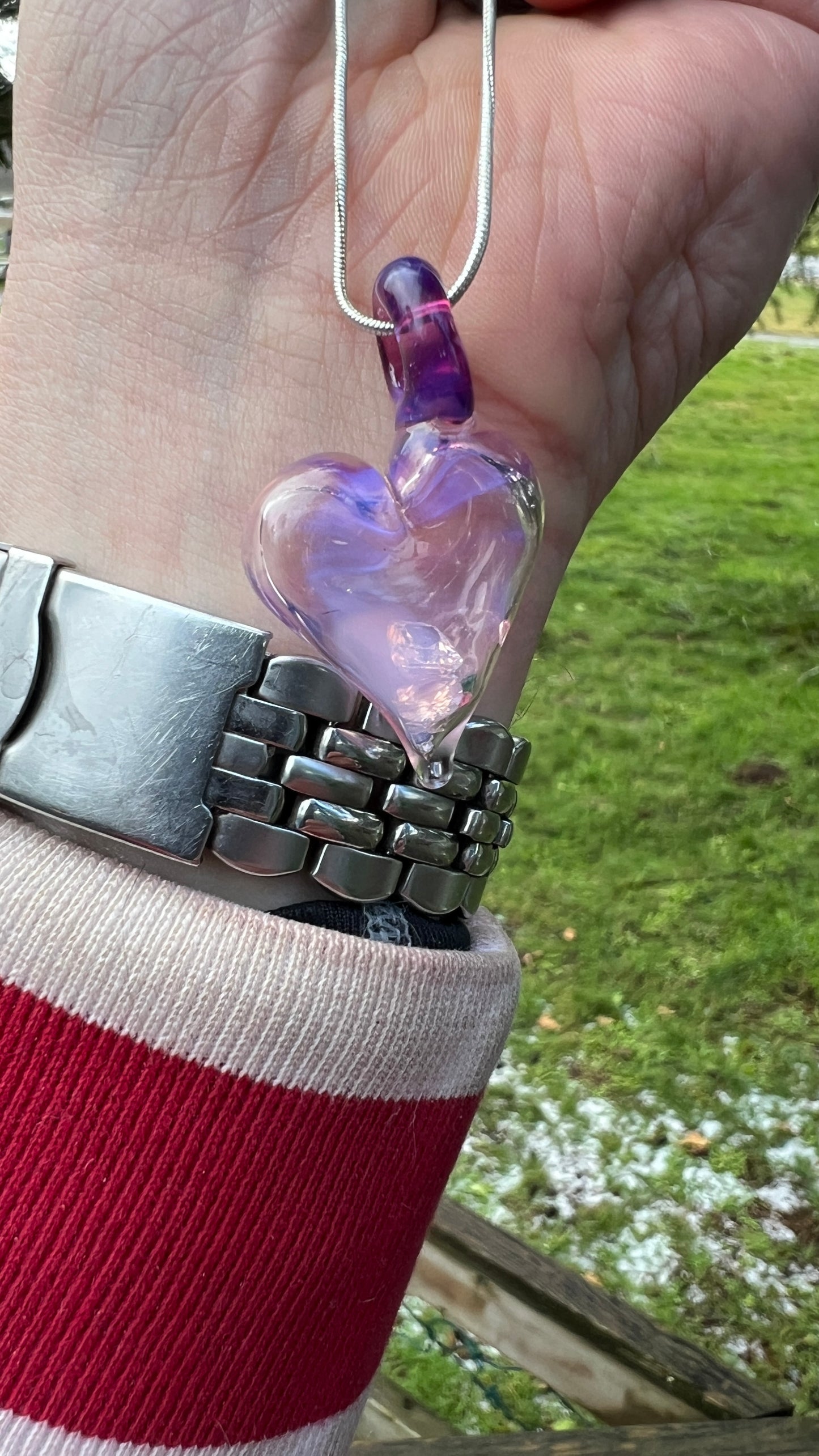 Hollow heart pendant filled with real Gemstones