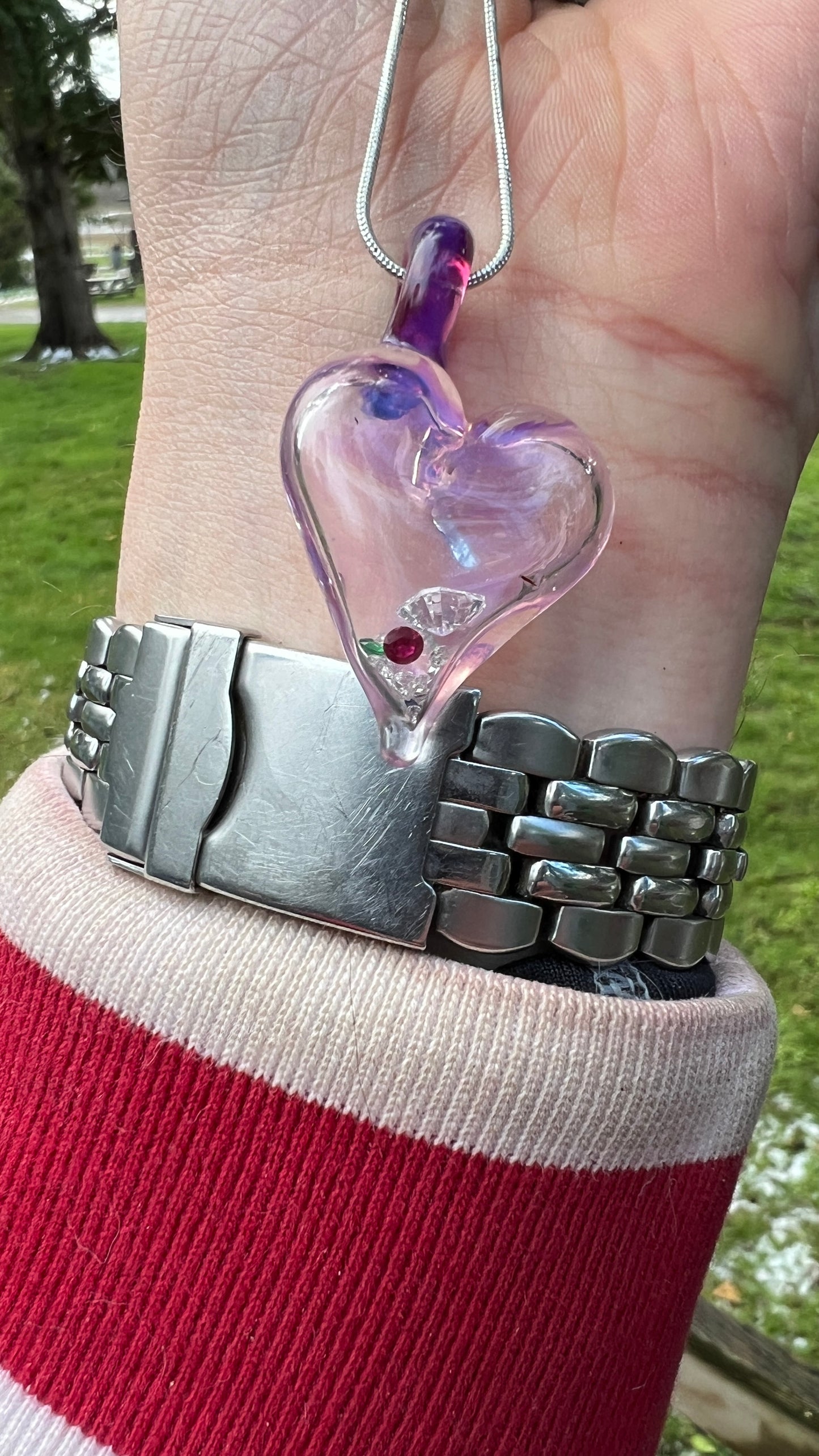 Hollow heart pendant filled with real Gemstones