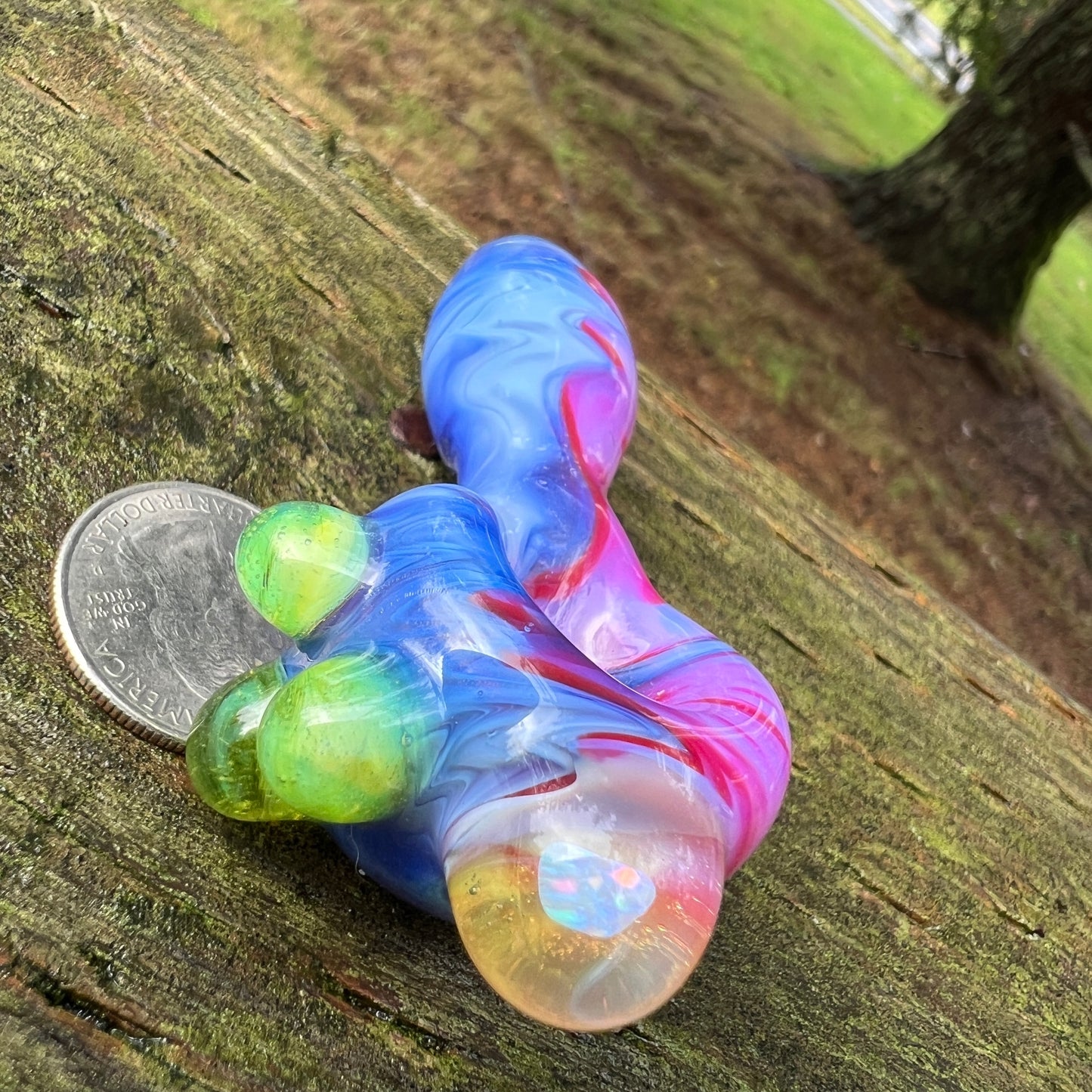 Heady glass UV reactive spoon pipe with encased Opal