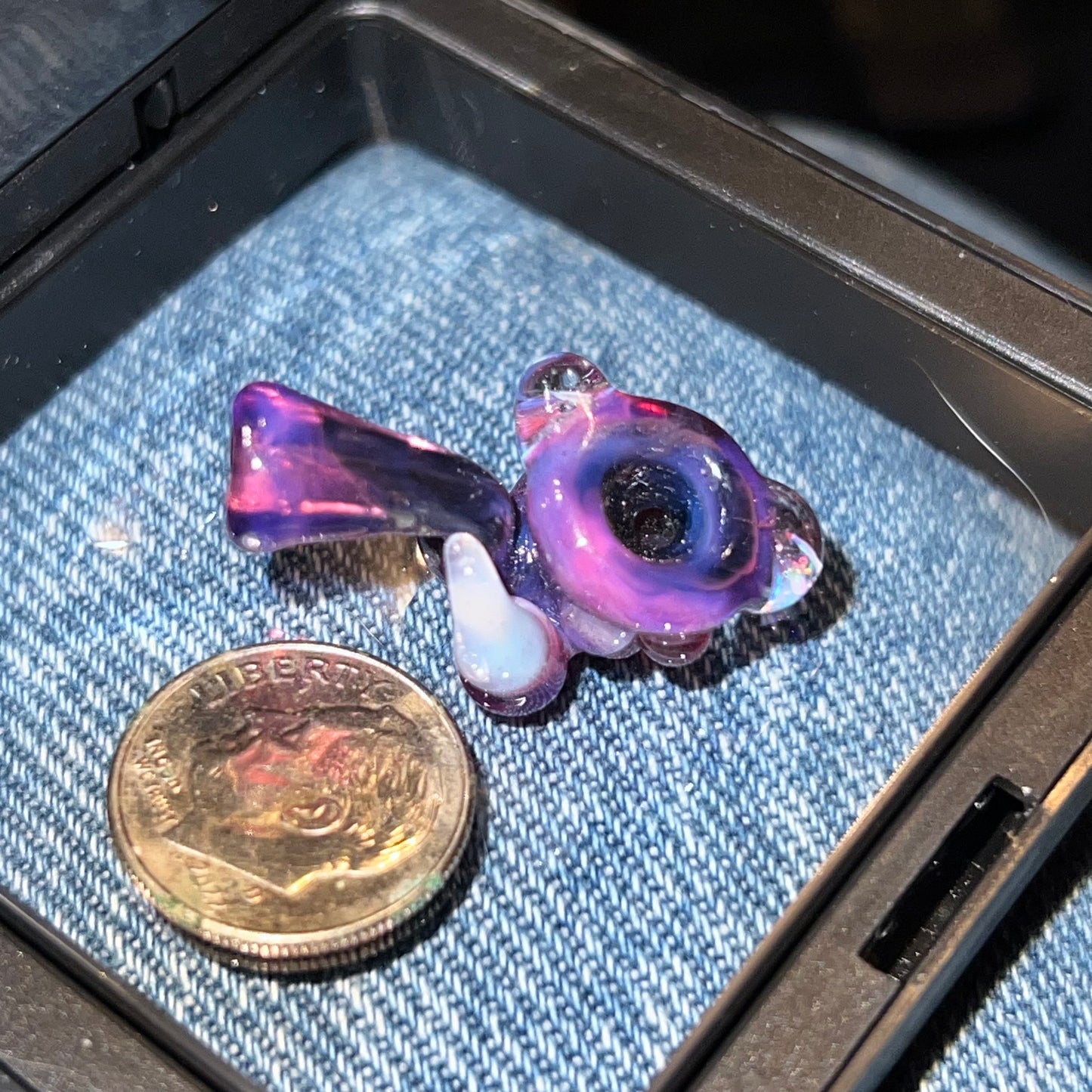 Miniature Sherlock made with Royal Jelly over Jet Black with encased opals and uv reactive accents