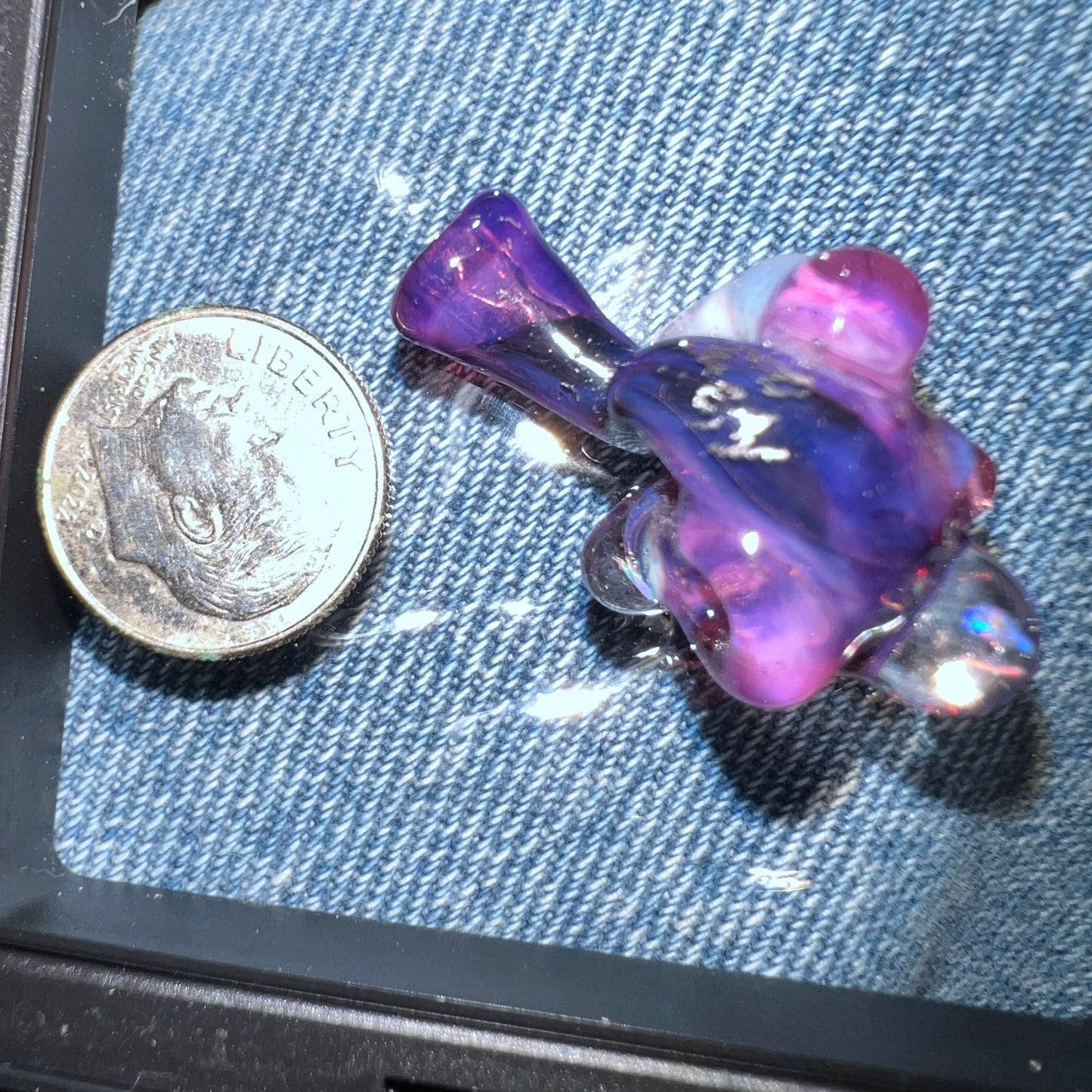 Miniature Sherlock made with Royal Jelly over Jet Black with encased opals and uv reactive accents