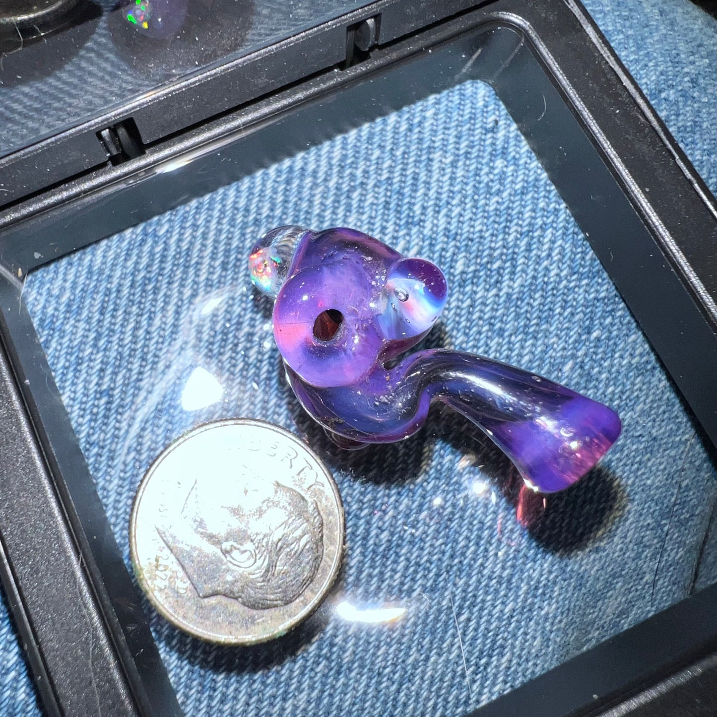 Miniature Sherlock made with Royal Jelly over Jet Black with encased opals and uv reactive accents